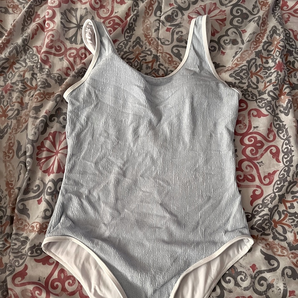 Size small. Blue one piece swimsuit